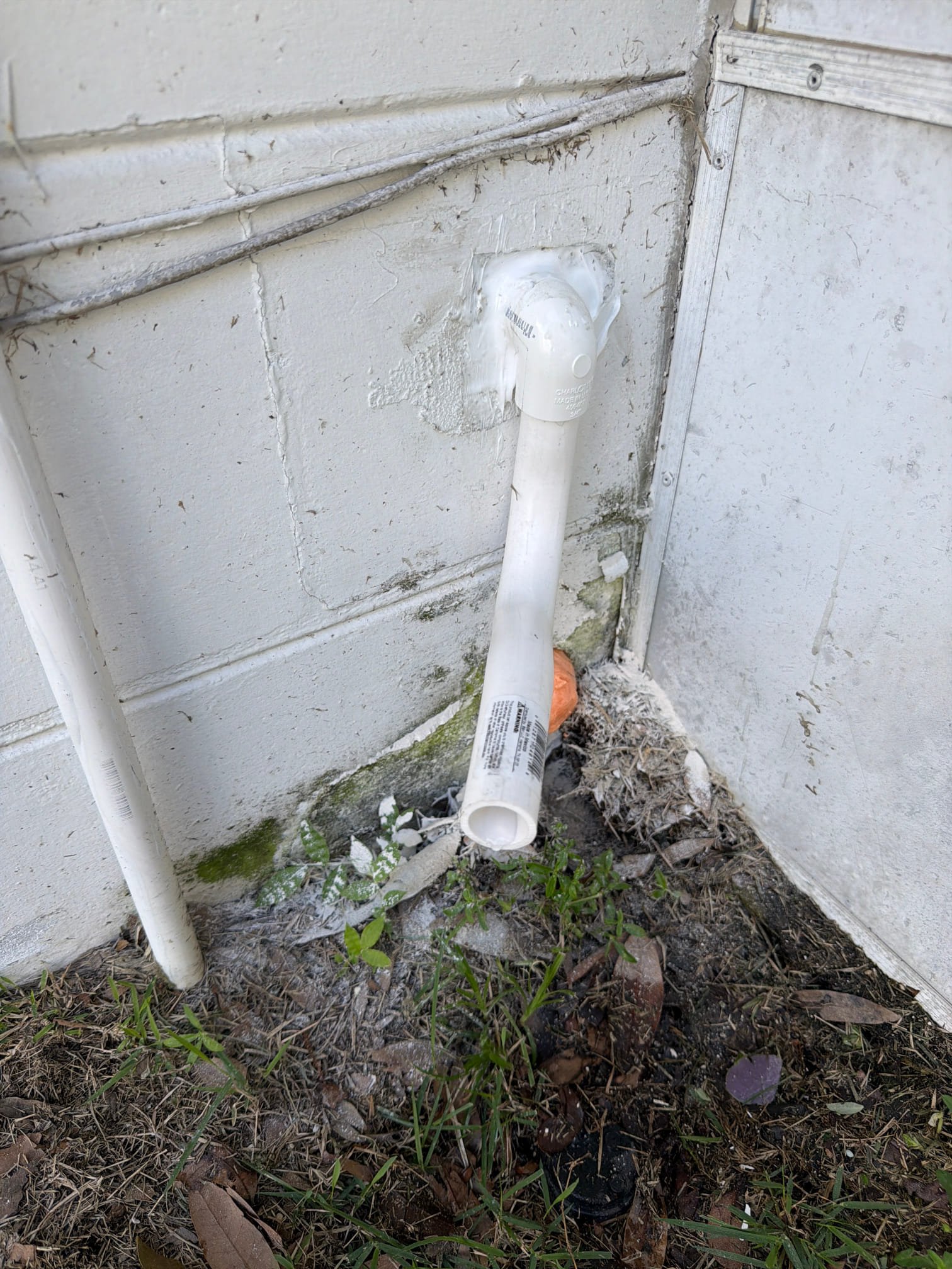 Remove Partial Drain to Re Pitch 
Remove P Trap 
Install Drain Line 1-2ft Higher 
Install New P Trap 
Spray Foam Existing Hole 

*Concrete bit needed 