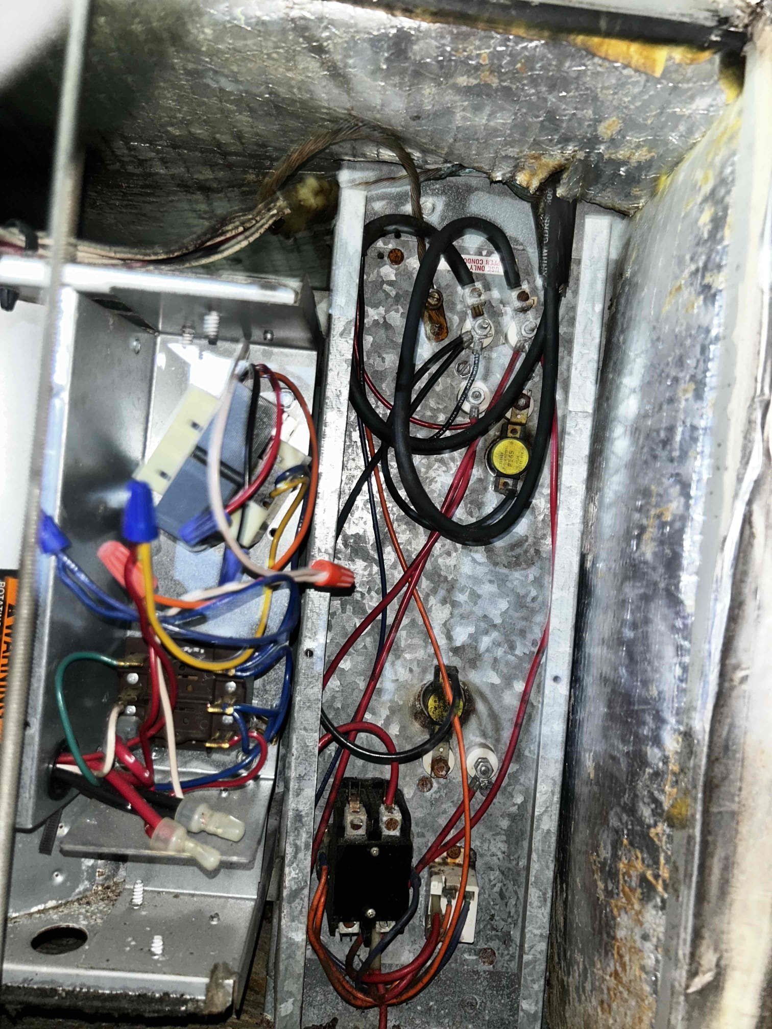 Upon arrival, I found the air handler had a low-voltage issue caused by a failed transformer that was shorted out. The system is approximately 26 years old and currently does not have a fuse protection installed. While checking refrigerant pressures, I also found a refrigerant leak at the Schrader valve.

At this time, the system is experiencing multiple issues and further diagnostics would be needed to determine what is causing the electrical short. I discussed repair options with the homeowner; however, the homeowner stated they were looking for only a temporary fix and did not want to invest heavily into repairs. Due to the age and condition of the system, I explained that a temporary repair would not be a reliable option. I recommended system replacement as the best long-term solution. If the homeowner decides to move forward with repairs or replacement, they can reach out to schedule further service.