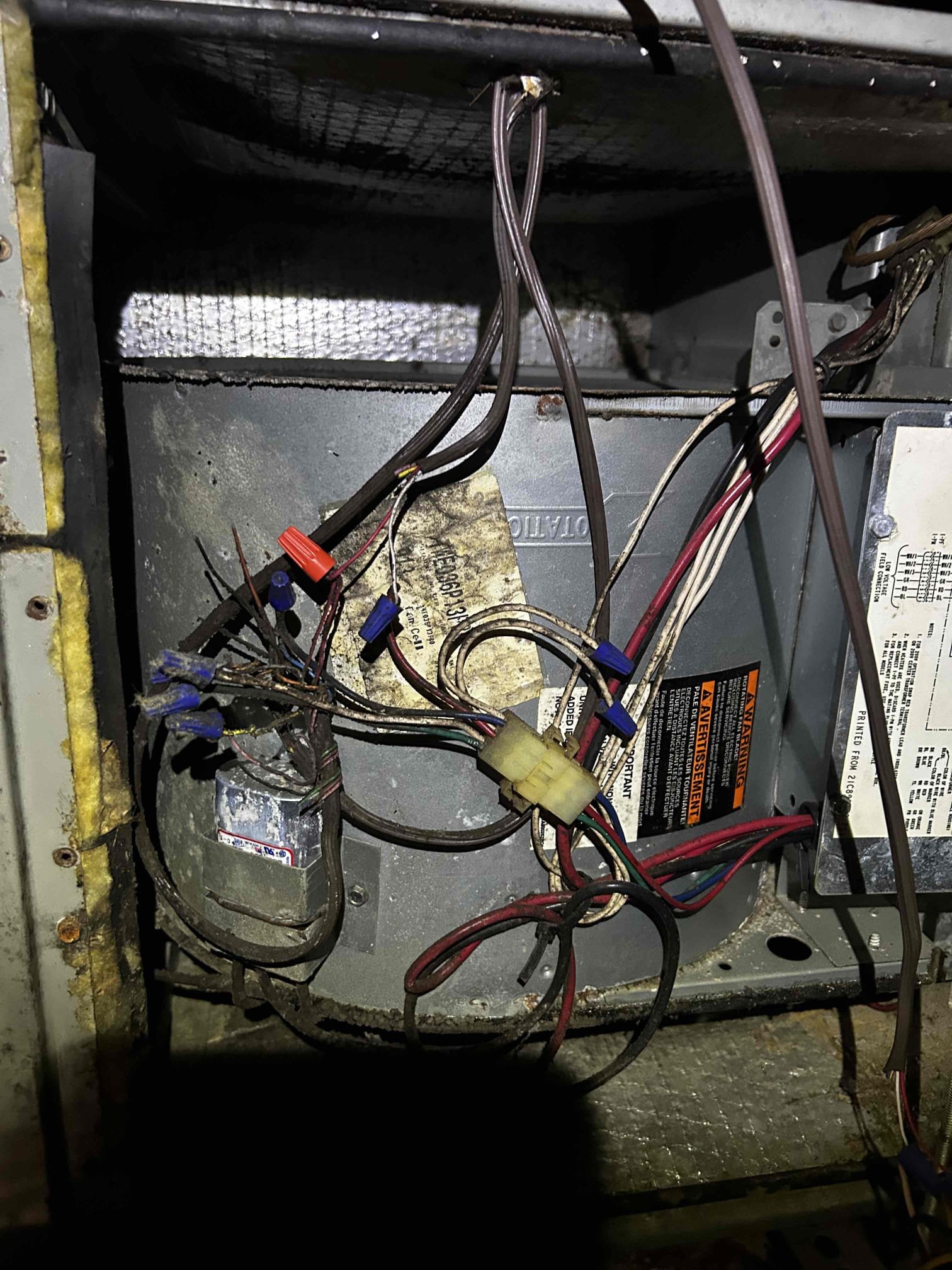 Upon arrival, I found the air handler had a low-voltage issue caused by a failed transformer that was shorted out. The system is approximately 26 years old and currently does not have a fuse protection installed. While checking refrigerant pressures, I also found a refrigerant leak at the Schrader valve.

At this time, the system is experiencing multiple issues and further diagnostics would be needed to determine what is causing the electrical short. I discussed repair options with the homeowner; however, the homeowner stated they were looking for only a temporary fix and did not want to invest heavily into repairs. Due to the age and condition of the system, I explained that a temporary repair would not be a reliable option. I recommended system replacement as the best long-term solution. If the homeowner decides to move forward with repairs or replacement, they can reach out to schedule further service.