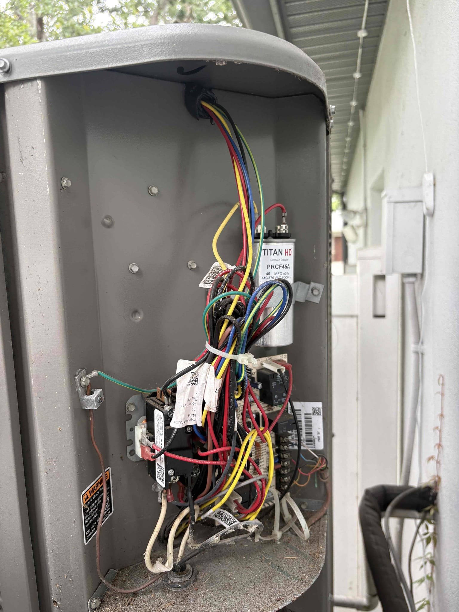 Home owner states unit is running but not cooling. Found compressor on hard lockout. Water in float safety. Drain line was cleared. Unit most likely short cycled. Compressor could potentially have internal damage. If happens again would recommend replacing compressor. 

Unit is currently operating within manufacture specifications. Checked starting components, pressures, and amp draws. 