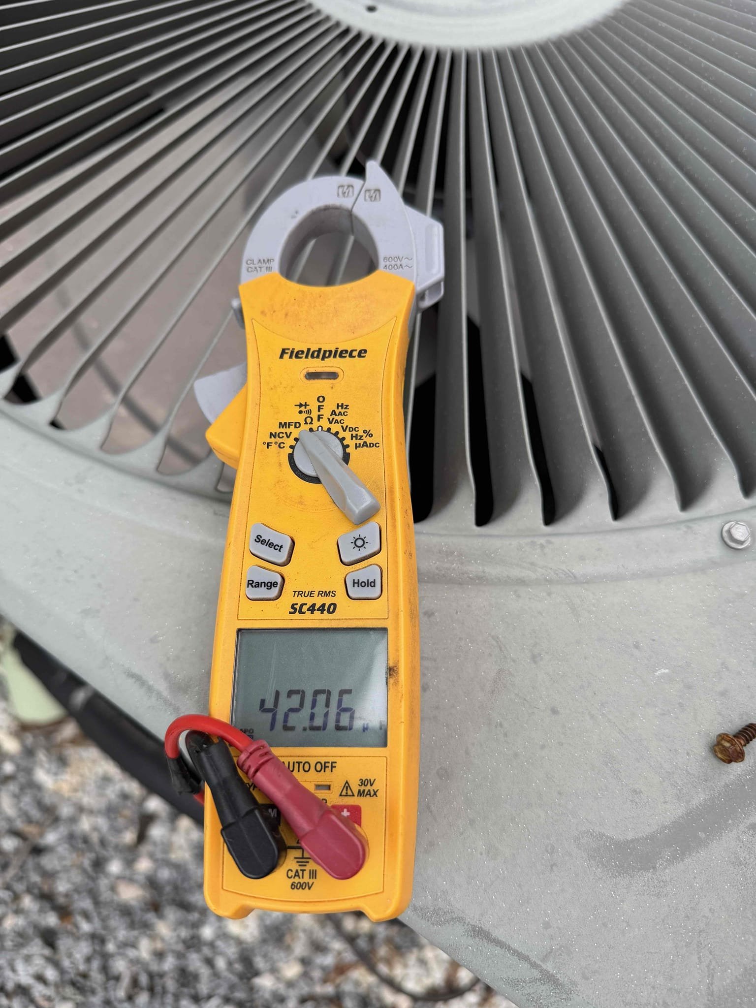 Performed Maitenence on system. Cleaned/treated drain line and primary drain pan. Cleaned condenser coils. Evaporator coils are clean. Verified safety float switch functionality. Checked amp draw on compressor. Checked amp draw on fan motor. Checked capacitor is not within factory range. Inspected Contactar. Made sure all connections are tight. System is cooling with a 20° temperature split at this time.

Recommending replacement of capacitor. Client would like to hold off at this time. 