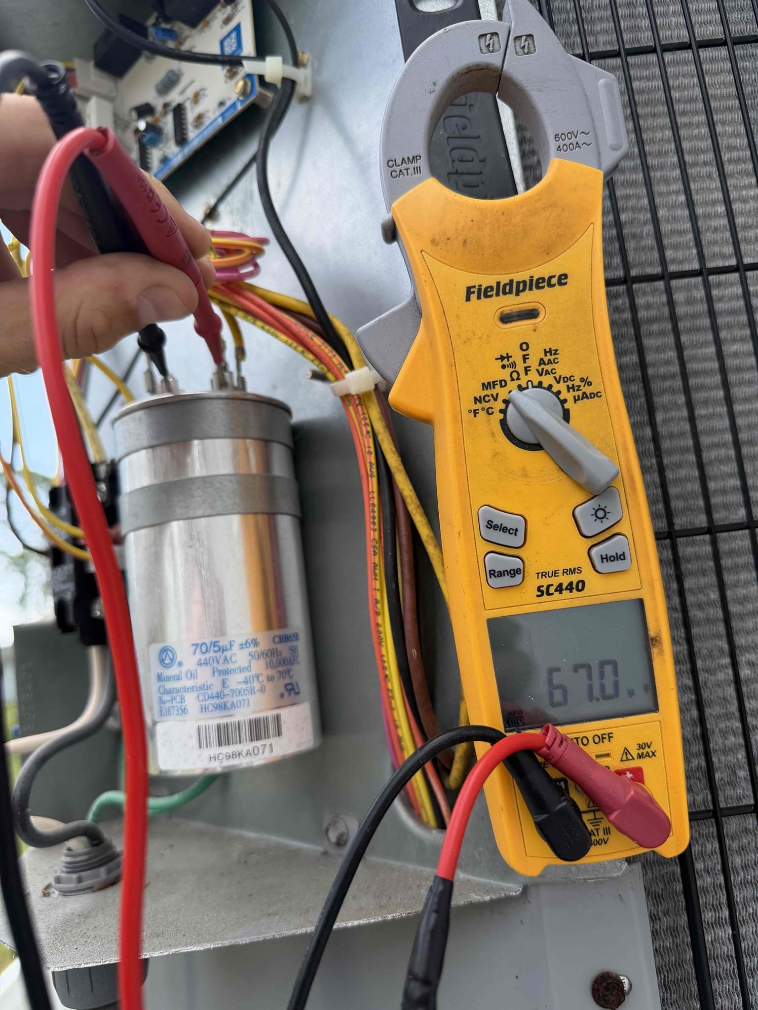 Performed Maitenence on system. Cleaned/treated drain line and primary drain pan. Cleaned condenser coils. Evaporator coils are clean. Verified safety float switch functionality. Checked amp draw on compressor. Checked amp draw on fan motor. Checked capacitor is not within factory range. Recommending replacing capacitor but client would like to leave it. Advised client on the stress this weak capacitor may put on the system. Inspected Contactar. Made sure all connections are tight. System is cooling with a 20° temperature split at this time.

Inside air handler there is biological growth present. Showed client and offered cleaning with a UV system. Client would like to hold off for now. 