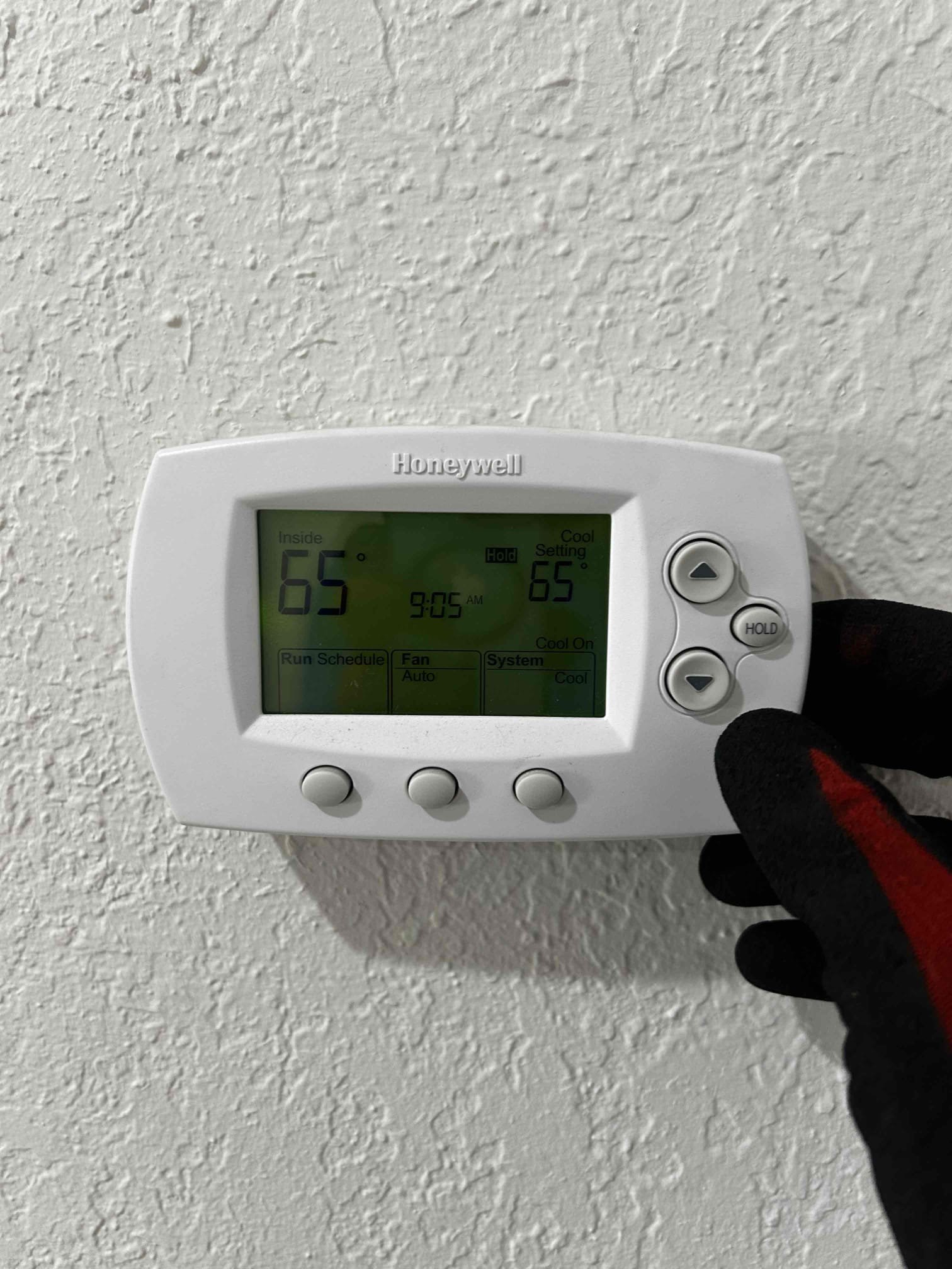 Upon arrival, I started by checking the temperature difference between the supply and return air. The system had an 18° temperature split, which is within a healthy operating range.

I then checked the refrigerant cycle and found no signs of leaks or restrictions at this time. Moving on to the electrical components, both motors and the compressor were operating within proper amperage range with no signs of overamping, shorts, or burnt electrical components.

Overall, the system is mechanically functioning properly with no signs of immediate failure. During today’s maintenance, I performed a drain line treatment, condenser coil cleaning, and an air handler inspection. Overall, the tune-up went well and there are currently no mechanical recommendations for the system.

The homeowner mentioned interest in upgrading to a Wi-Fi thermostat when replacing the current thermostat. During inspection, I found that the existing thermostat wiring was never upgraded when the previous homeowners repl