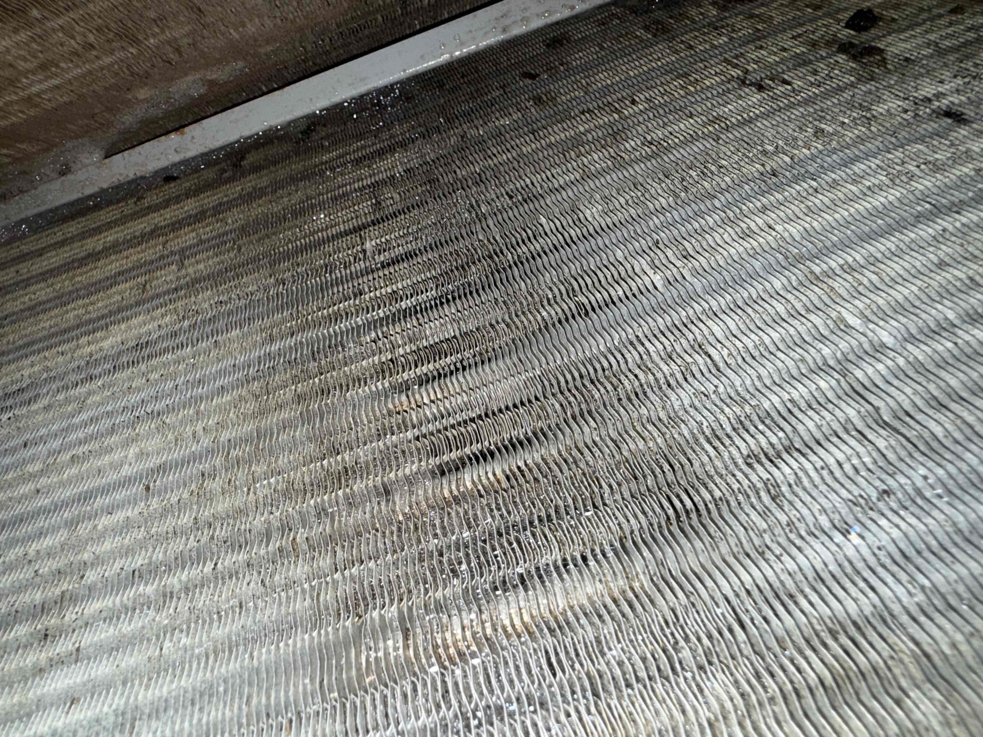 On arrival found unit not cooling properly due to improper settings on thermostat. Programmed thermostat and tested. Found unit shutting down due to clogged drain. Cleared pan and drain. Added chemical to help prevent growth. Cleaned in place evap coil. Cleaned outdoor condenser coil. Added refrigerant back to factory specs. Unit is cooling properly at this time. 