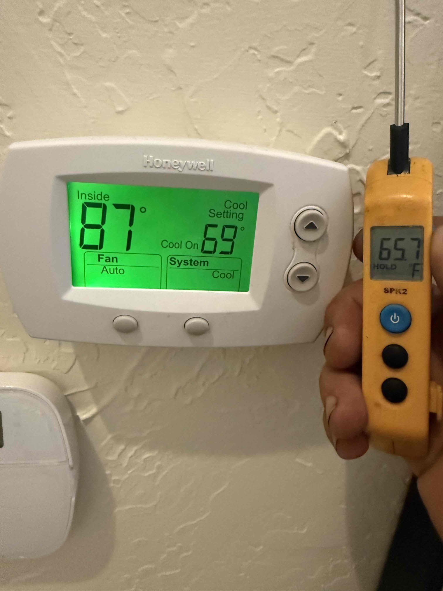 On arrival found apartment unit not cooling due to linset being penetrated by roofers and loss of all refrigerant. Will return tomorrow to make repairs with roofers. 
Found leak in line set. Made repairs. Pressure tested. Pulled vacuum on system. Added refrigerant back to factory specs. Start and test. Unit is cooling properly at this time. 