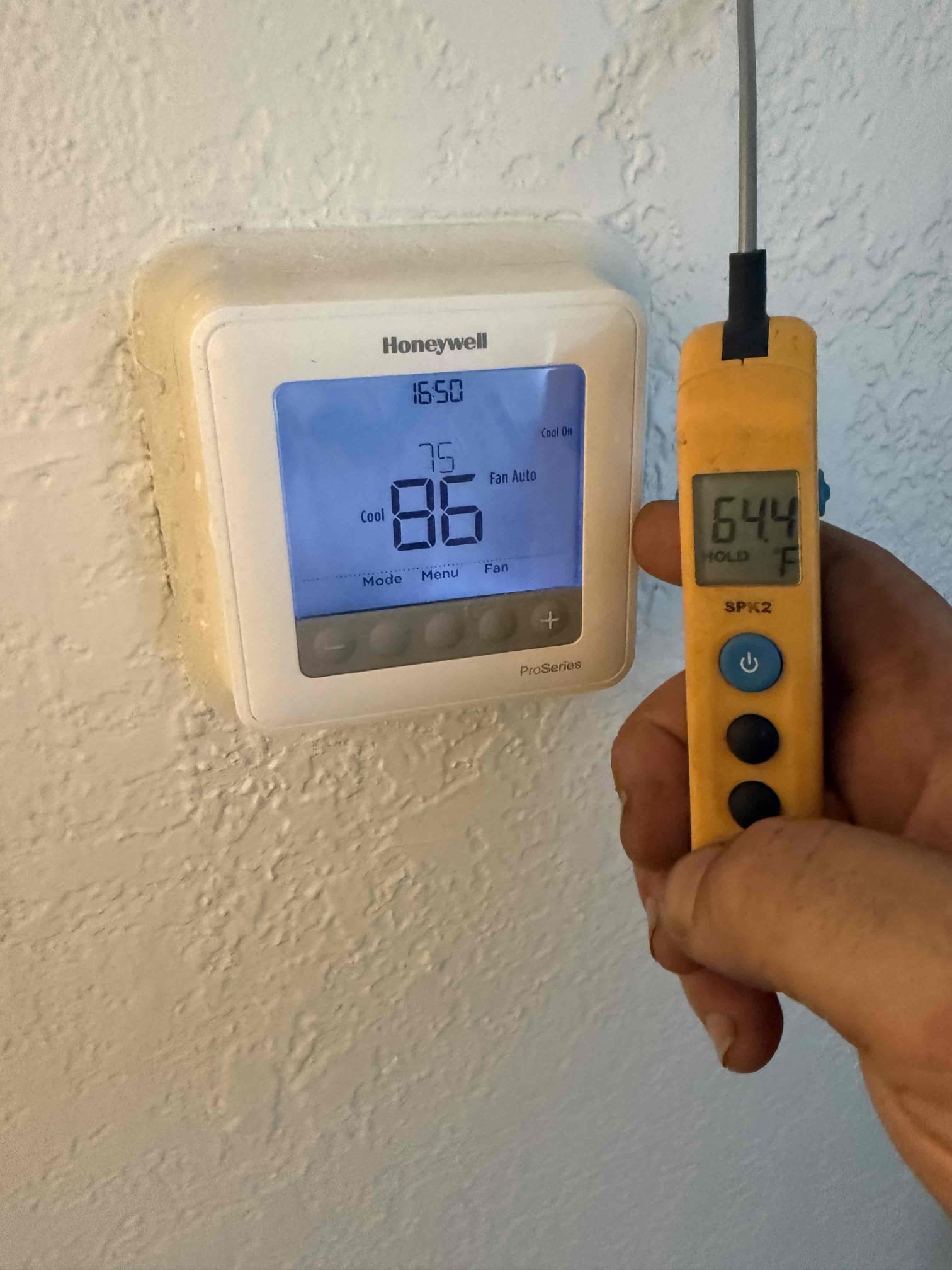 On arrival found unit not cooling properly due to blower motor shorted and spinning backwards. Replaced motor. Start and test. Pressures good. Temp split good. Cleared drain. Unit cooling properly at this time. 
