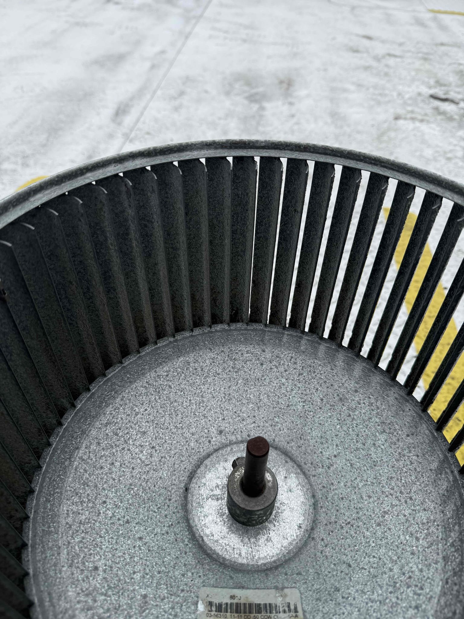Pull and clean blower wheel. Reinstall and test. Tax and labor included.