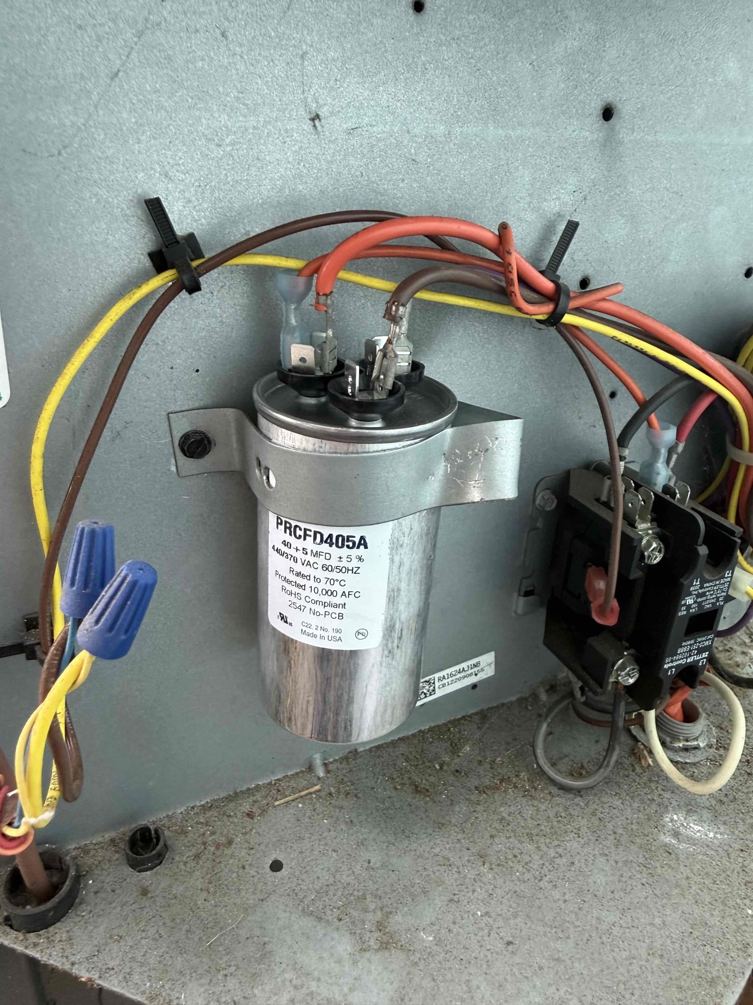 Reason for call:
No cool 

Equipment:
2022 ruud 
Horizontal in attic 
Condenser in front of home 

Summary:
Found unit off on float switch on arrival found capacitor weak. Flushed drain line and pan to restore drainage. Replaced capacitor due to weak readings. Unit is up and cooling again. 