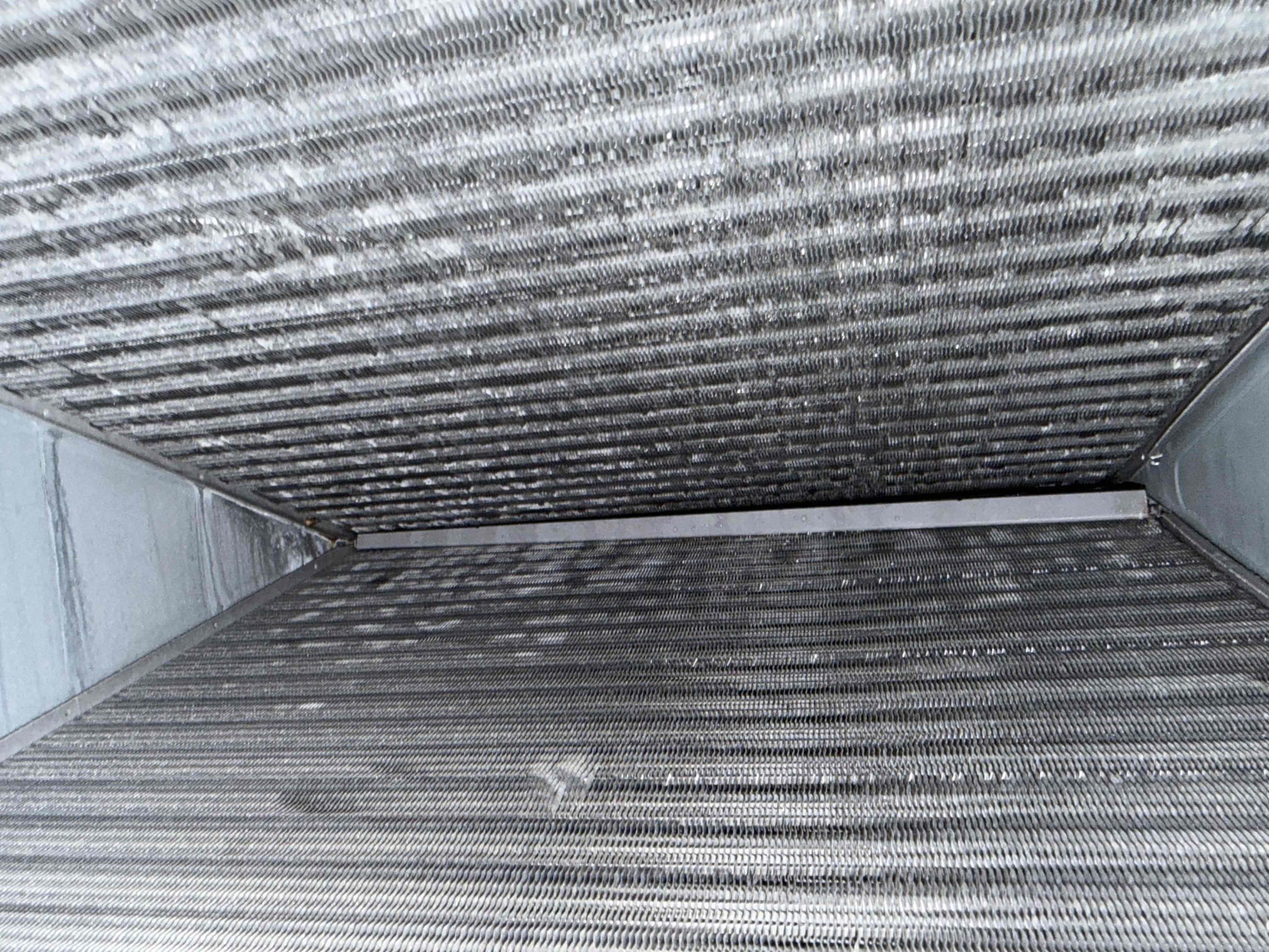 Performed Maitenence on system. Cleaned/treated drain line and primary drain pan. Cleaned condenser coils. Evaporator coils are clean. Verified safety float switch functionality. Checked amp draw on compressor. Checked amp draw on fan motor. Checked capacitor is within factory range. Inspected Contactar. Made sure all connections are tight. System is cooling with a 20° temperature split at this time.
No visible growth inside air handler at this time. Blower wheel is clean as well. 
Client signed up for 1 system Maitenence plan. 

Client says there has always been issues with their back room getting air flow. Let client know duct work is very old and some parts are collapsing and they should plan for duct work replacement in the future if they would like to resolve these issues. 