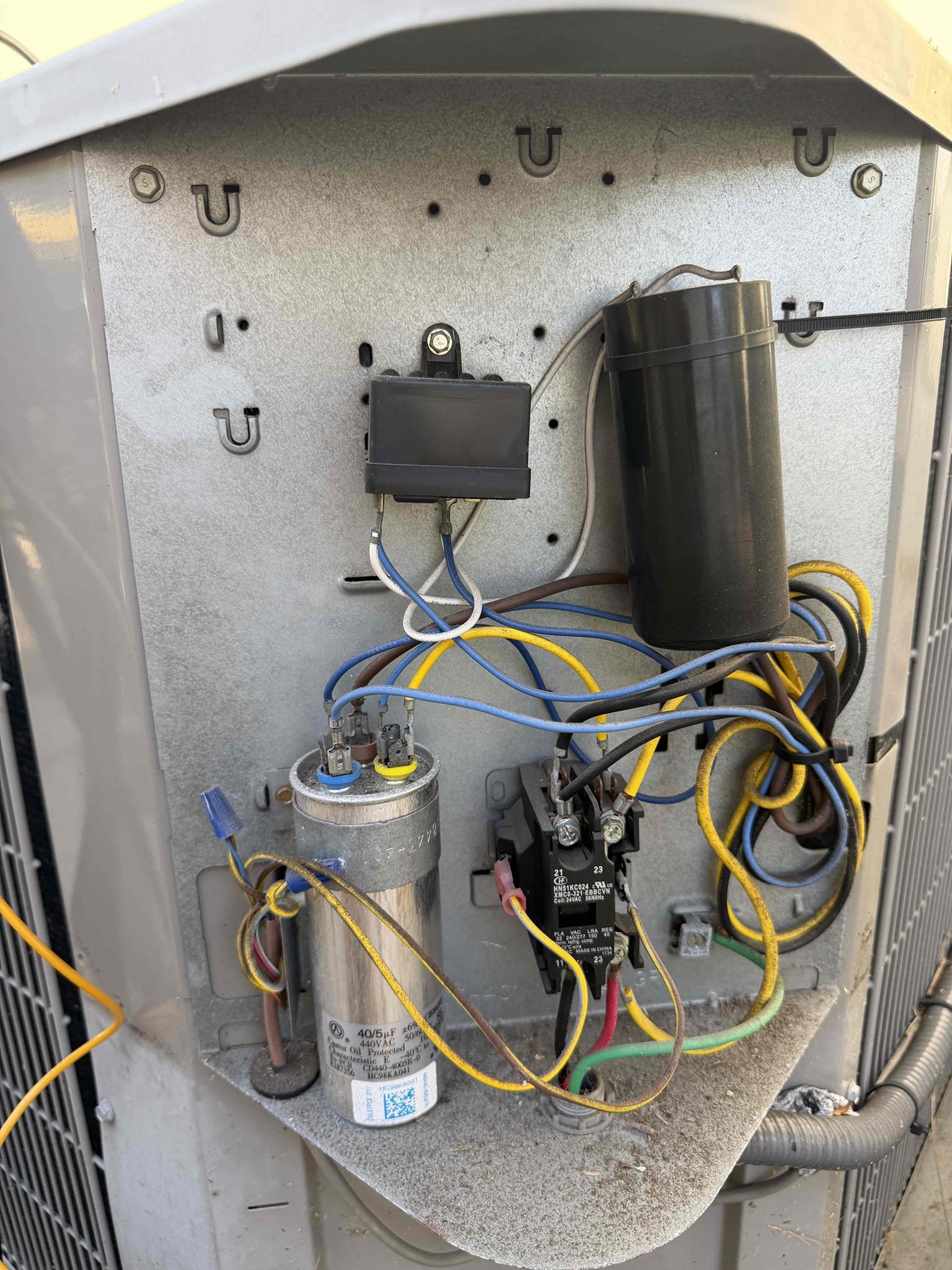 Performed Maitenence on system. Cleaned and treated drain line and primary drain pan. Rinsed condenser coils. Checked amp draws. Inspected evaporator coils and found them clean. Checked capacitor and found completely dead capacitor and system was only able to start up because of a hard start kit. Amp draws on compressor was close to its max rating. No drain line P trap present. No primary safety float switch. No p trap on drain line. Both of these are allowing attic and outside air into the home. Temperature at return plenum is 85° and indoor temp is 77 indicating attic air is entering the system. System has a 16° temperature split indicating inefficiency. Found system has low subcool (3° with target of 12°) and is low on refrigerant for a TXV Found multiple large holes in the return flex duct. Re recommend replacing this duct for efficiency. Found small amount of debris on indoor blower wheel. 

System has very old duct work. 
Client is going to install primary safety switch himself a