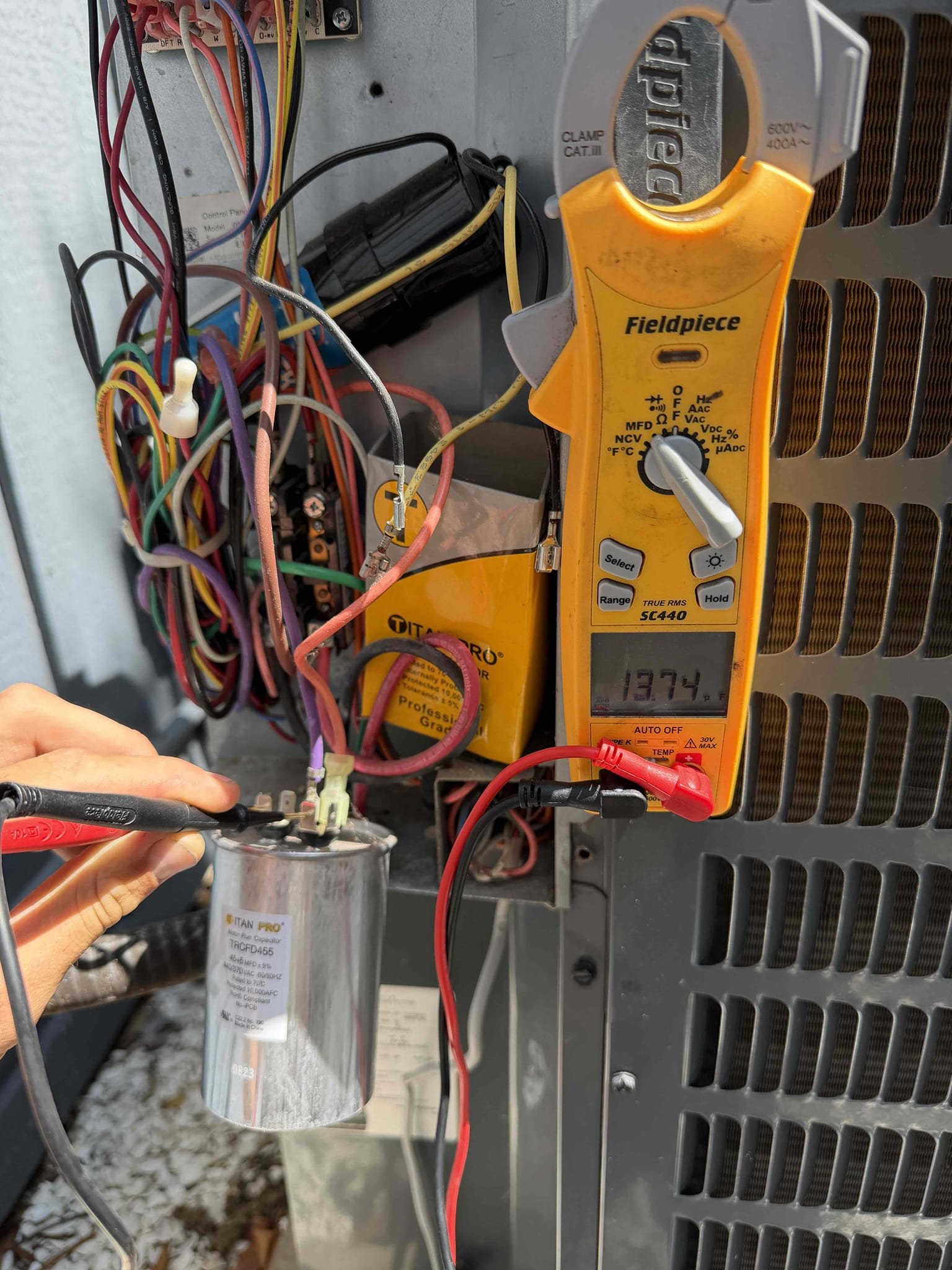 Upon my inspection, found front of home system has a clogged drain line and a very weak capacitor. Performed a drain cleaning and treatment on drain line and primary drain pan. Replaced capacitor and fastened capacitor properly inside condenser service panel. Started system and system has a good 20° temperature split. 
Client is signing up for 2 system Maitenence plan and we will need to return to complete Maitenence when the home is vacant as there are Airbnb guests here currently. 
Thermostat schedule is set to 65°. Advised client to change set point to 72 instead as system will struggle to cool to 65