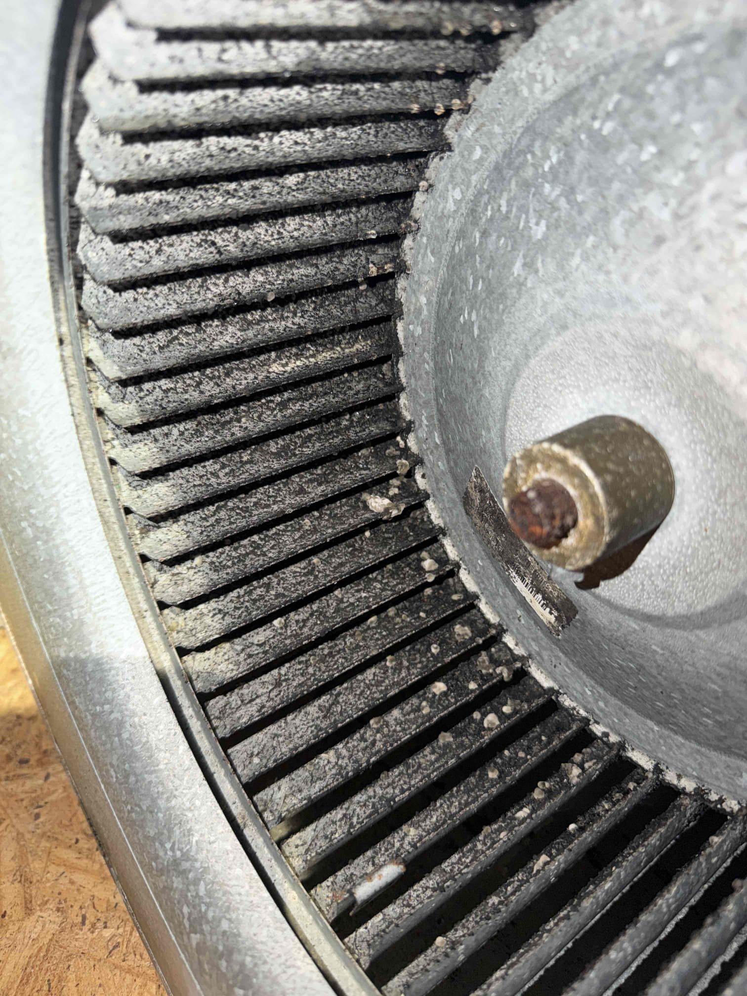 Upon my inspection, found failed indoor blower motor. 
Also found bacteria growth inside air handler and a weak condenser capacitor. 
Replaced the blower motor with an aftermarket motor on van. System may be under warranty still but client did not want to wait till Monday. Cleaned blower housing and blower wheel. Installed Uv system after sanitizing and cleaning inside air handler. Replaced capacitor. 
System is cooling with an 18° temperature split at this time. 
Performed first Maitenence today. 

1 year parts and labor warranty on motor, capacitor, and uv system after sanitizing 