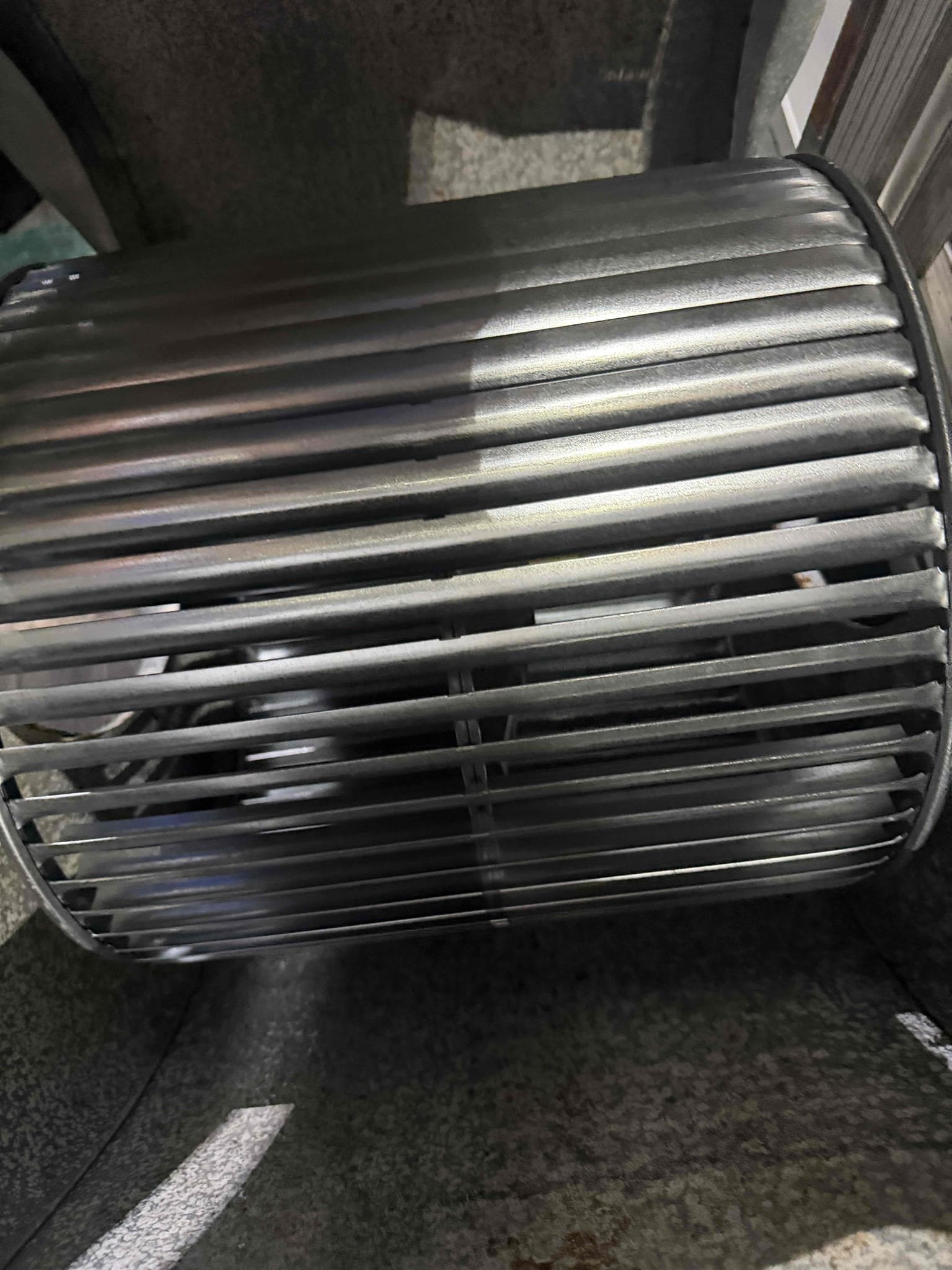 Replace air handler blower wheel for right side of home system. 
No guarantee on blower motor longevity as it has been running with an improperly balanced blower wheel. 
System is cooling with a 20° temperature split at this time and client is happy with the noise reduction. 
