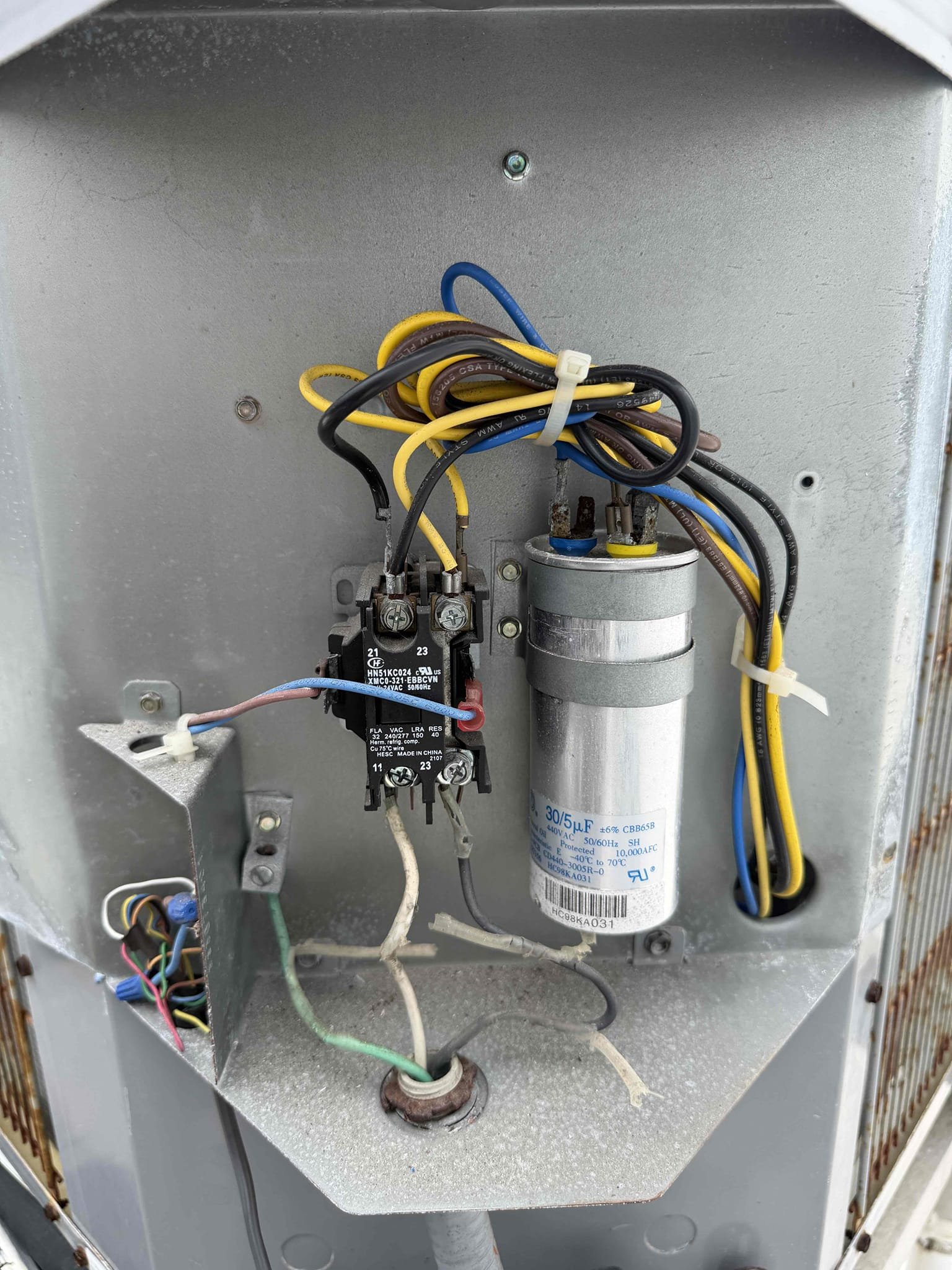 Scope of work:
Replace capacitor 
Replace contactar
Repair low voltage wiring at condenser
Clean evaporator coils. 

Performed full Maitenence on system. 
Cleaned and treated drain line and primary drain pan. Checked amp draws. Verified all wiring is secure. Checked temperature split. System is cooling with a 20° split at this time. 

Changed client supplied air filter today. 
