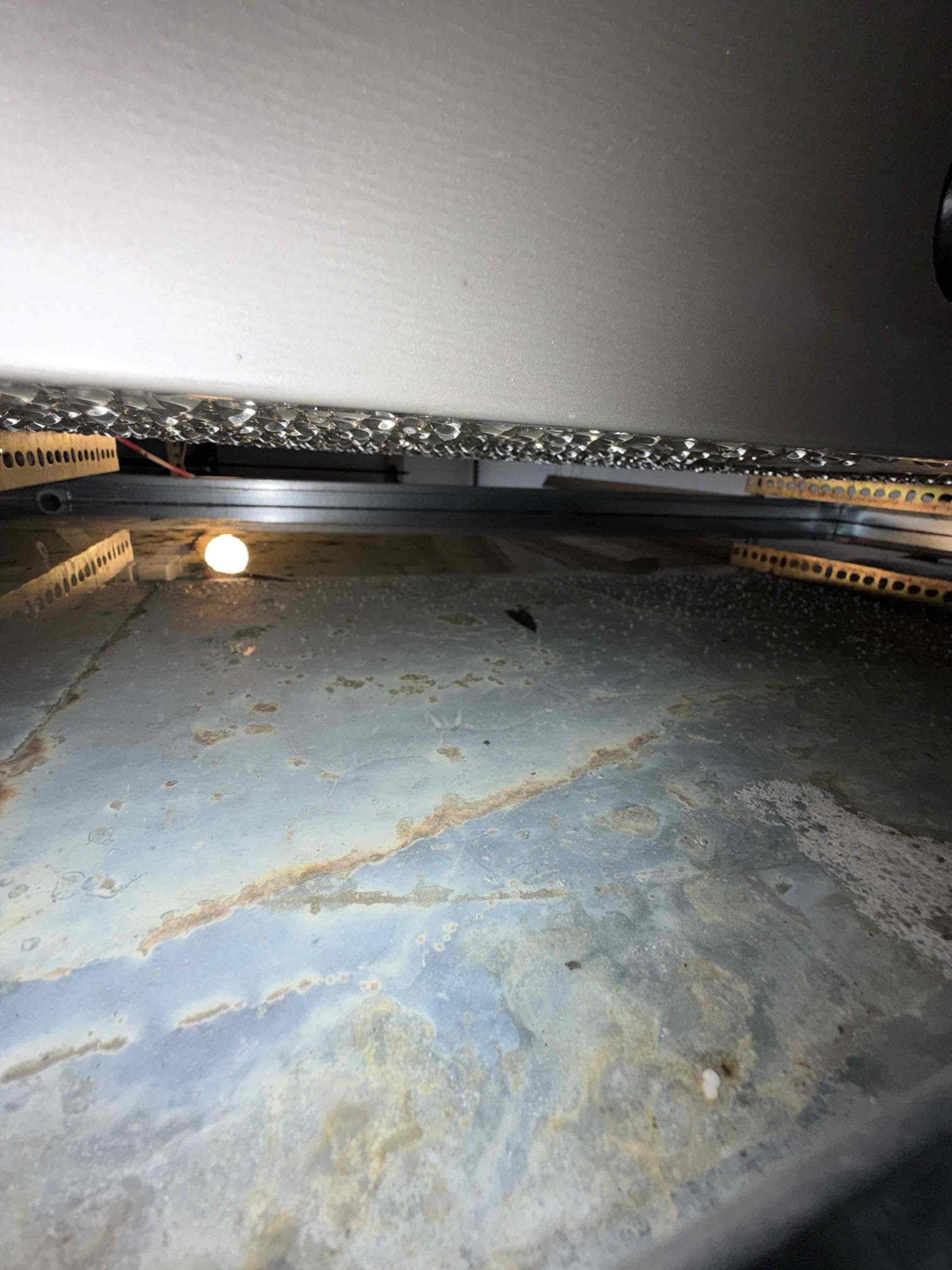 Upon my inspection, found system not cooling due to secondary pan full of water and tripped float switch. Found system has a severely dirty air filter, causing an airflow restriction. Also found drain line is clogged however, primary float switch was not tripped and still works properly.
Performed day, drain cleaning and treatment on system, remove removed all water from secondary pan, and replaced air filter with a client supplied air filter.
System is cooling and draining at this time.
This is the Client’s first summer in this house and the system was installed in 2025. If issue persist, we will need to dive deeper into the issue. Potential cracked primary drain pan or air flow issues. 
Client signed up for Maitenence plan today
First Maitenence performed. 

Also found dead lizard in air handler electrical compartment. Removed dead lizzard