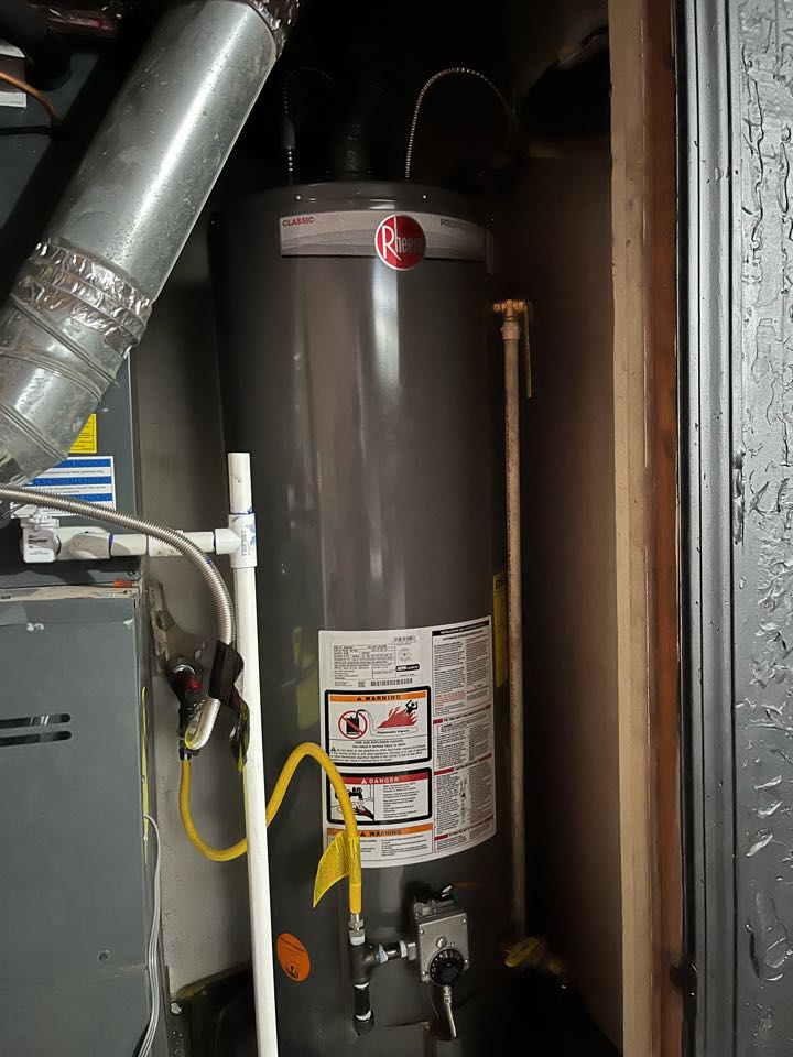 Installed new 40 gallon gas, Rheem water heater with 10 year warranty