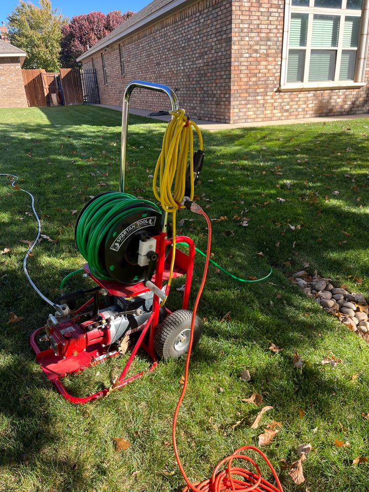 Ran hydrogen machine through outside drain gutters, and cleared stoppage