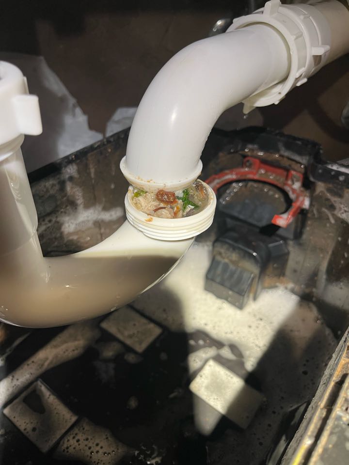 Cleaned the kitchen tubular drain out. Garbage disposal clogged the p-trap. 