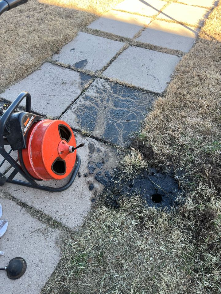 Ran sink machine through outside, clean out and cleared stoppage