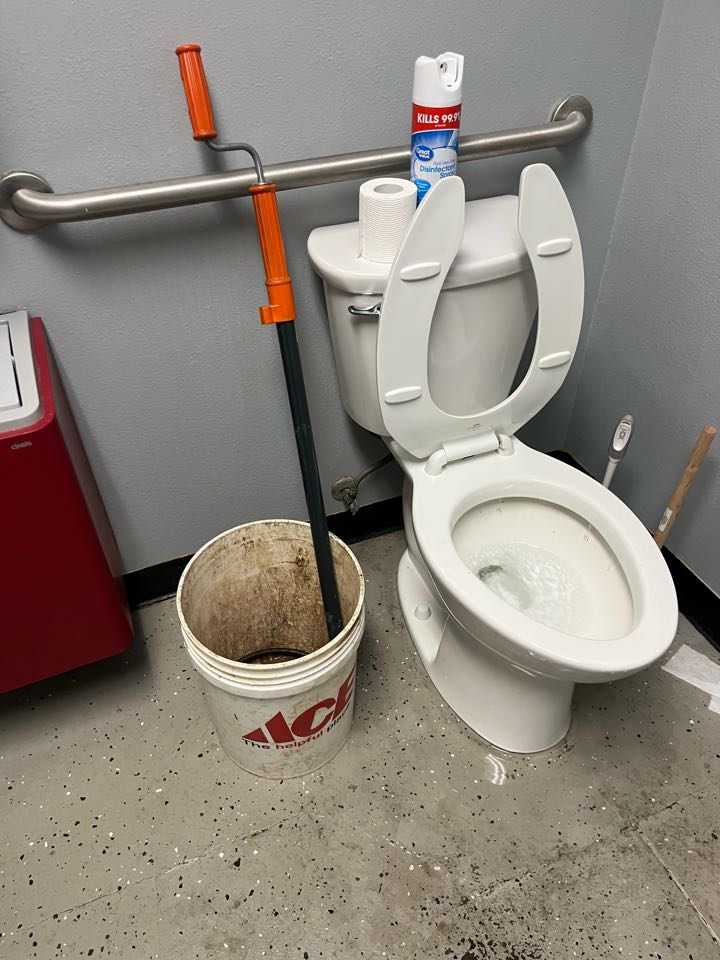 Ran closet, auger through commode and cleared stoppage