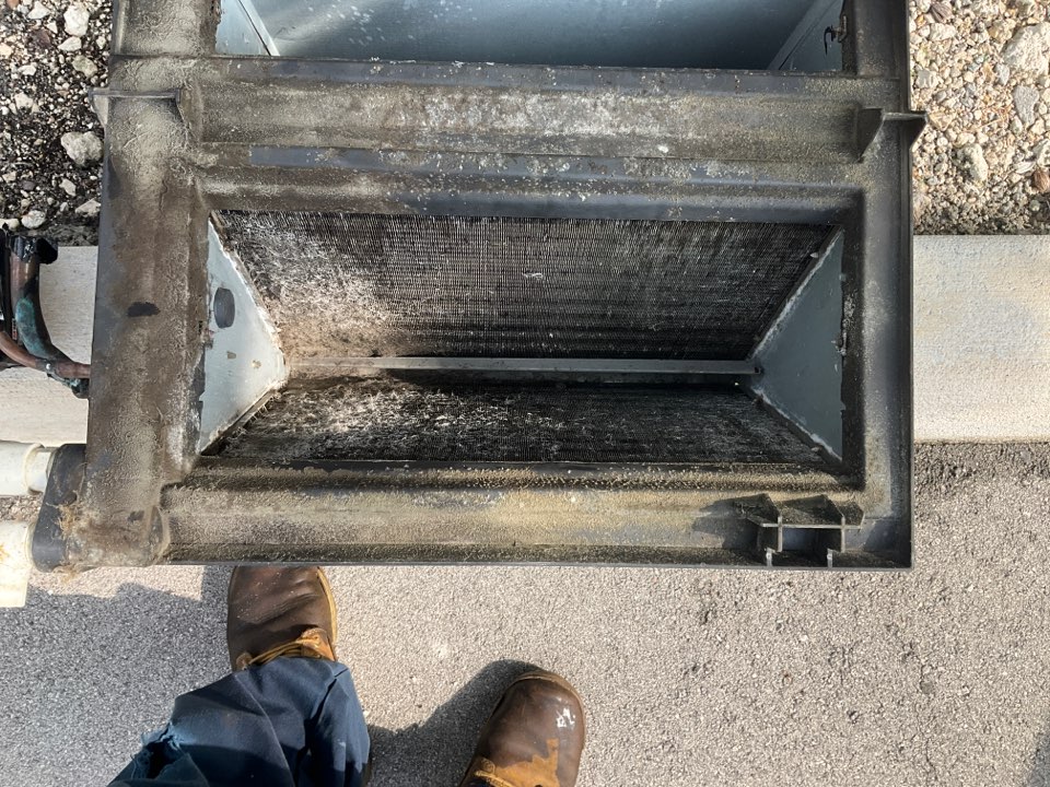AC Service Call. Perform coil cleaning on air conditioning system.