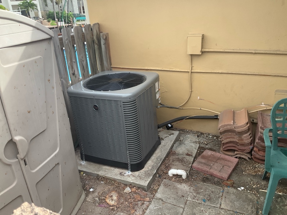 AC Installation. Install new Ruud split system and prepare unit for city inspection.