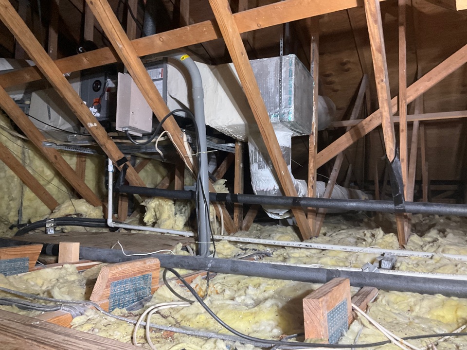 AC Service Call. Install new drain line for air conditioning system.