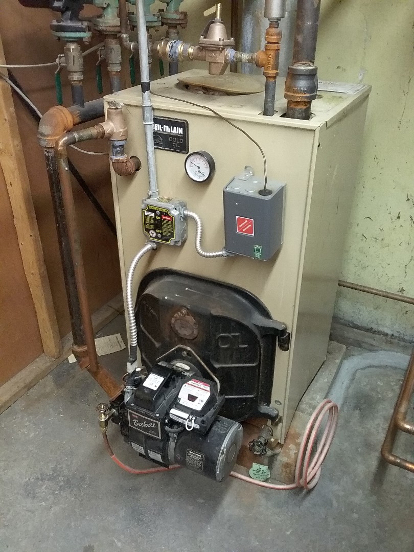 Performed preventive maintenance procedures on weil mclain oil fired boiler 