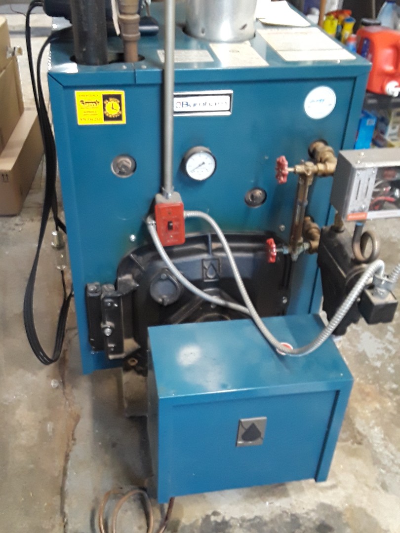 Clean and check Burnham oil steam boiler