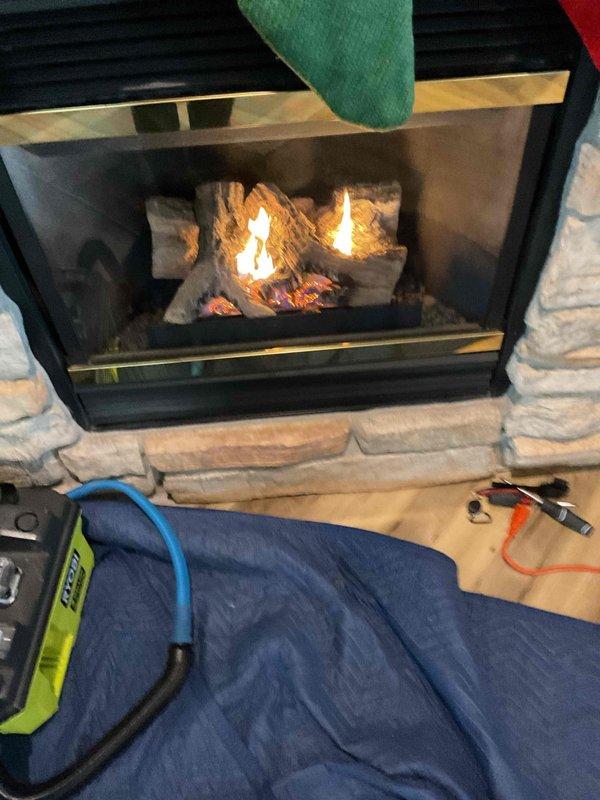 Responded to customer complaint of noisy fan in gas fireplace. Performed thorough cleaning of floor area, blower motor assembly, and glass. Rearranged ember bed to improve flame pattern and appearance. Demonstrated proper blower replacement procedure to customer as unit continued to exhibit noise after cleaning.
