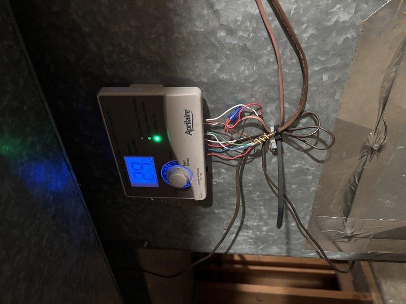 Responded to service call for non-functioning Aprilaire humidifier set to 27 but failing to maintain adequate humidity levels. Inspected Lennox furnace system and associated humidifier control unit. Diagnosed faulty wiring connections between control panel and humidifier. Repaired wiring, recalibrated control settings, and verified proper system operation. Humidity is now maintaining at set levels.