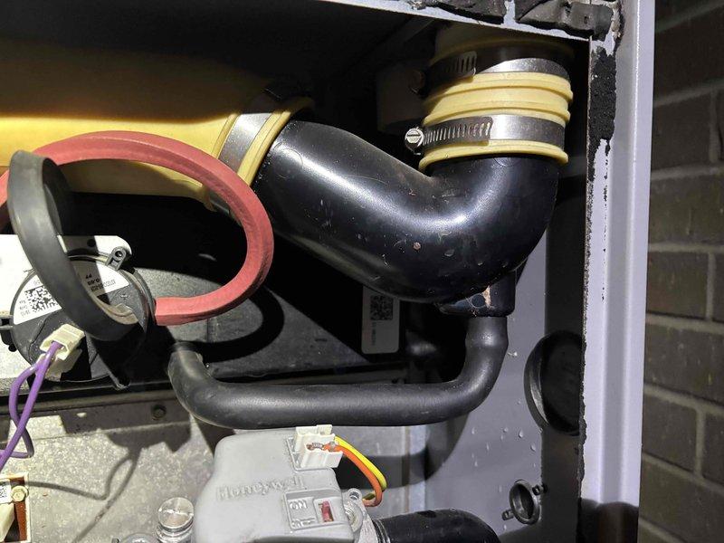 Responded to commercial service call for multiple non-functioning furnaces in chapel area. Diagnosed issue with condensate drain system - found blockage in PVC condensate line. Cleared obstruction, verified proper drainage, and confirmed all furnaces are now operating correctly with normal heat output.