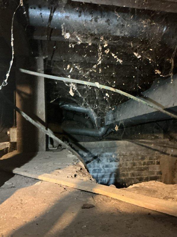 Responded to warranty no-heat call on furnace installed earlier this month. Diagnosed frozen condensate drain trap in crawlspace which caused system shutdown. Thawed frozen trap and installed preventative heat run in ductwork directed at drain to prevent future freezing.