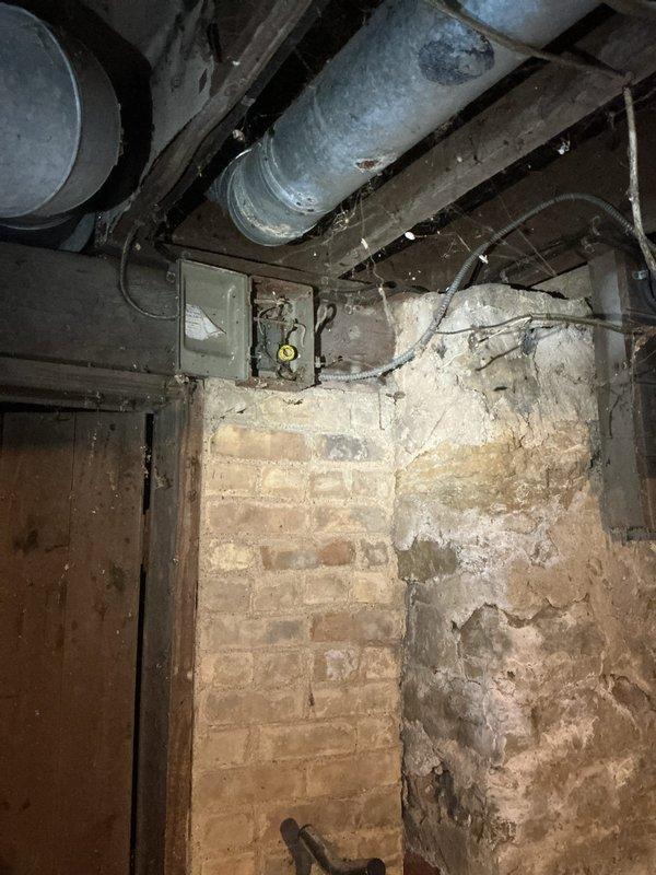 Responded to warranty no-heat call on furnace installed earlier this month. Diagnosed frozen condensate drain trap in crawlspace which caused system shutdown. Thawed frozen trap and installed preventative heat run in ductwork directed at drain to prevent future freezing.