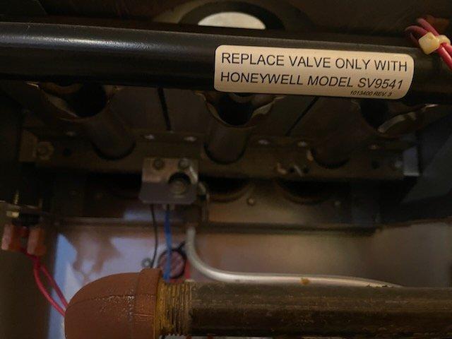 Responded to service call for a Heil furnace experiencing intermittent heat loss and complete failure. Diagnostic inspection revealed defective gas valve producing audible clacking sound when touched. Replaced faulty Honeywell SV9541 gas valve according to manufacturer specifications, ensuring proper connection of all electrical components. System now operating normally with consistent heat output.