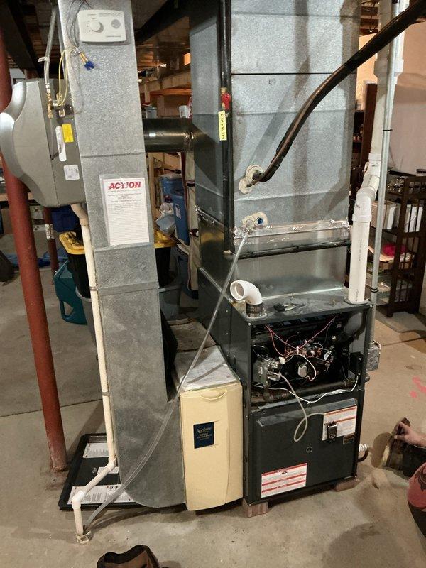 Responded to no-heat complaint on 2-stage gas furnace covered under parts and labor warranty. Diagnostic testing revealed open rollout switch caused by deteriorated burners with significant rust buildup. Replaced damaged burners to restore proper ignition sequence and safe operation of heating system.