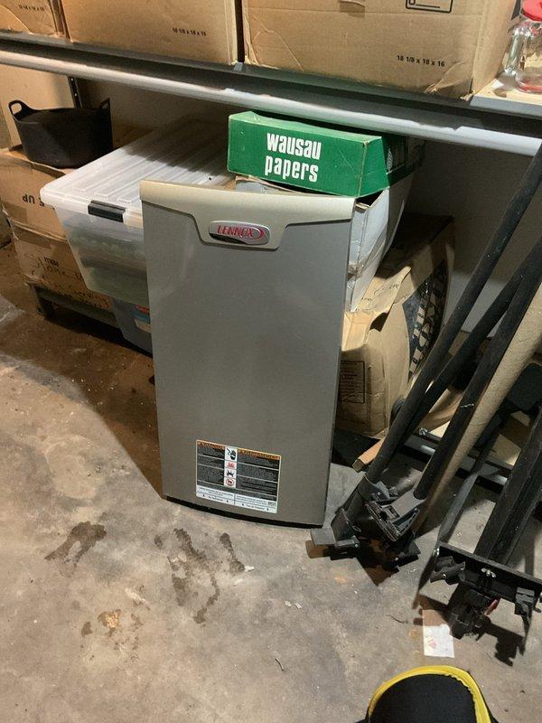 Responded to no heat complaint for a Lennox HVAC system under 10 years old. Diagnosed and serviced the unit located in basement storage area, including verification of duct measurements and system components. Restored heating functionality to bring temperature above the reported 55°F setting.