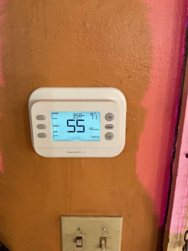 Responded to tenant complaint of uneven heating with some rooms very cold. Diagnosed issue as insufficient water pressure in the boiler system. Restored proper pressure in circulation lines which should normalize heat distribution throughout the unit. Verified thermostat was functioning properly with heat mode activated, currently showing 47°F actual temperature with 55°F set point.