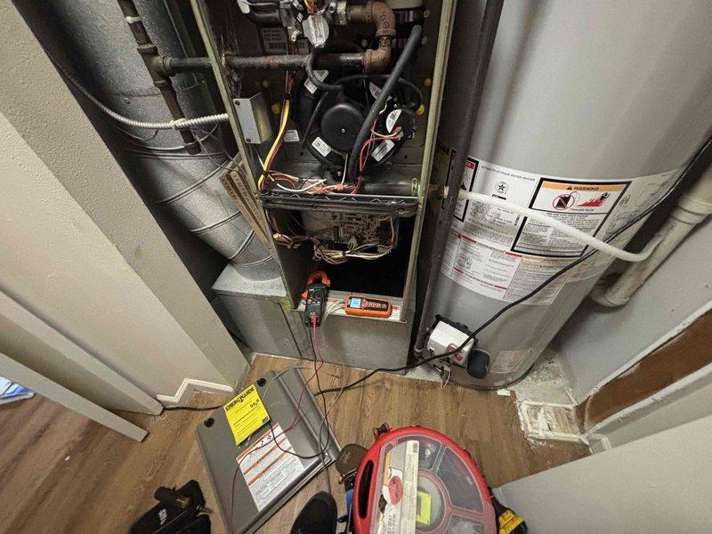 Responded to customer complaint of non-functioning furnace with no heat. Diagnosed failed igniter and faulty gas valve as primary issues. Completed necessary repairs to restore system operation. Provided customer with replacement options for aging furnace and AC units as requested.