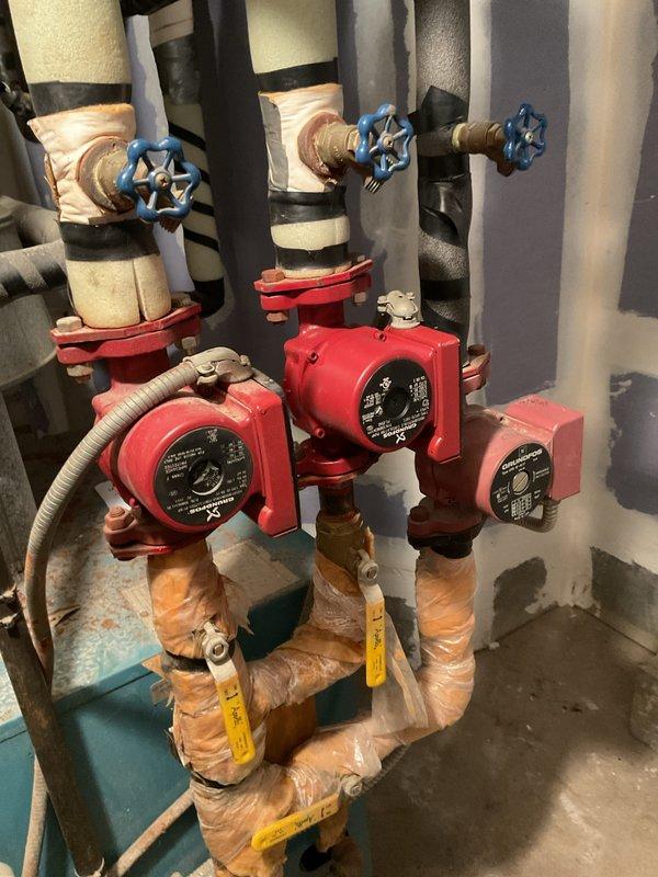 Replaced failed second floor circulating pump on heating system. Installed new pump on copper supply lines and thoroughly bled all radiators to ensure proper system operation and heat distribution.