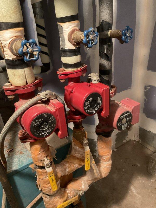 Replaced failed second floor circulating pump on heating system. Installed new pump on copper supply lines and thoroughly bled all radiators to ensure proper system operation and heat distribution.