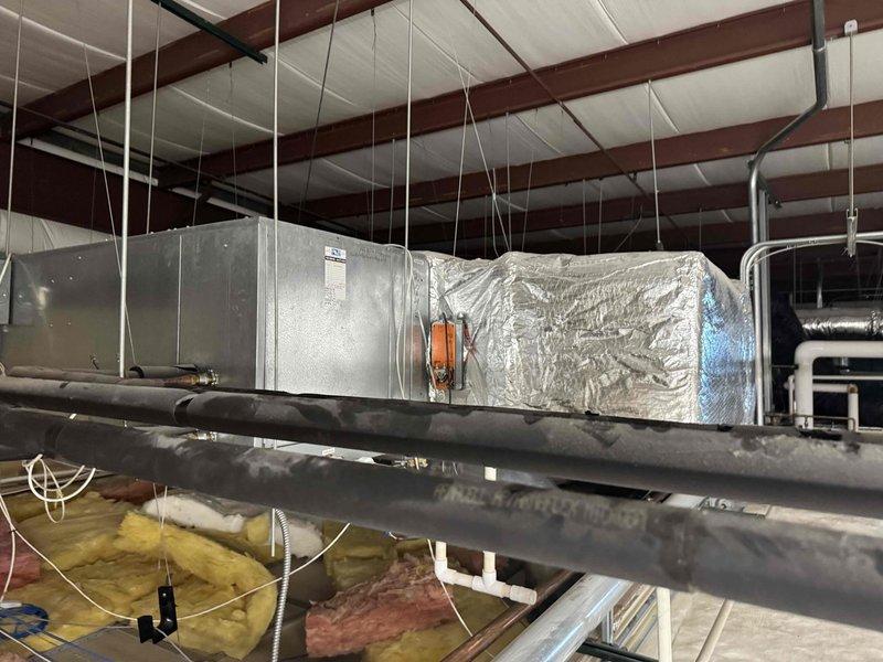 Responded to service call for furnace diagnosis at commercial property. Inspected ceiling-mounted HVAC system including main furnace unit, ductwork, and drainage components. Evaluated condition of insulation, electrical connections, and ventilation system to identify and address operational issues.