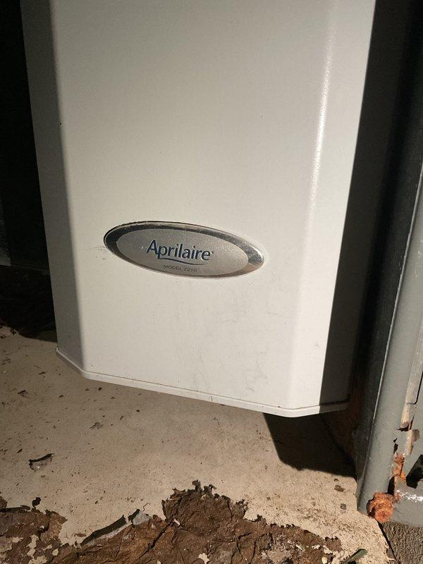 Responded to customer-reported E2 code on Goodman furnace with complete loss of heat. Residence temperature was 40°F despite thermostat setting of 65°F. Inspected Aprilaire unit and electrical connections in utility room, identified and corrected issue causing error code, and verified proper system operation before completion.