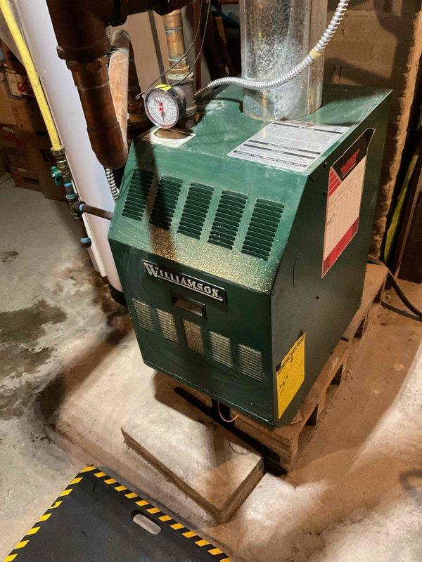 Responded to service call for intermittent boiler operation in Williamson heating unit. Diagnosed issue with poor thermostat wire connections. Remediated by cutting back wire, cleaning connection points, and properly reconnecting components, which restored reliable system operation.