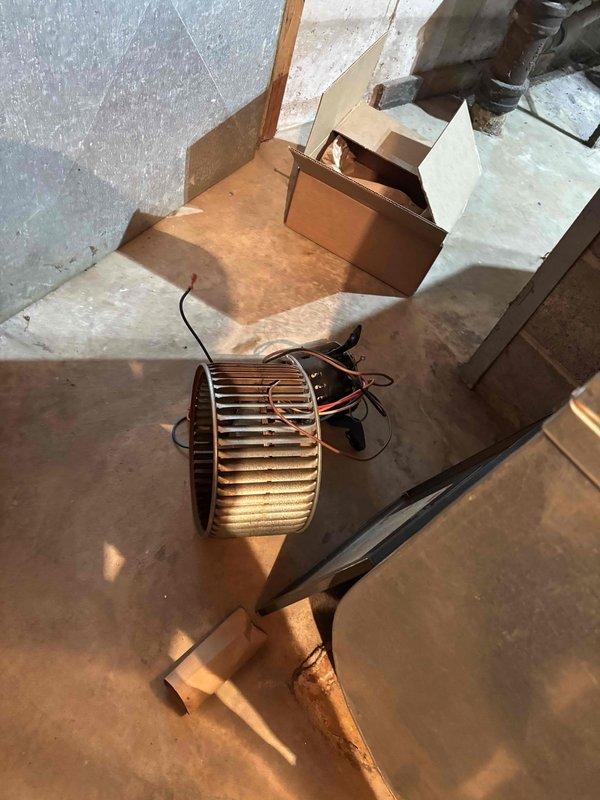 Replaced defective blower motor and wheel assembly in HVAC unit. Disconnected circuit board connections and removed failing components. Installation completed successfully with motor replaced under manufacturer warranty (labor not covered). System restored to proper operation.