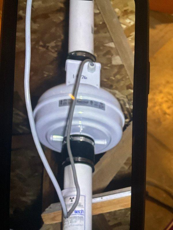 Completed installation of a new radon mitigation fan in customer's residence, replacing the malfunctioning unit from the original 2016 system. Secured proper connections to existing PVC piping with appropriate brackets and verified proper installation. System is now operational and functioning as designed.