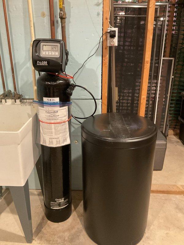 Responded to customer complaint of water leakage near furnace. Diagnostic inspection revealed completely plugged humidifier causing drainage failure. Service included thorough cleaning of humidifier unit and all associated drainage lines, restoring proper system operation and eliminating water leakage issue.