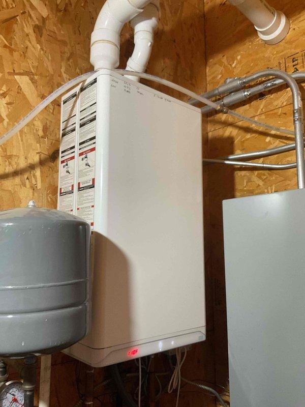 Responded to no heat call due to low water error on wall-mounted boiler. Diagnosed slow leak with no auto-fill capability from initial installation. Attempted to clean water fill valve but insufficient water pressure prevented proper operation. Manually filled system using hose to restore proper water pressure. Performed combustion check and cleaned condensate trap to ensure optimal system performance.