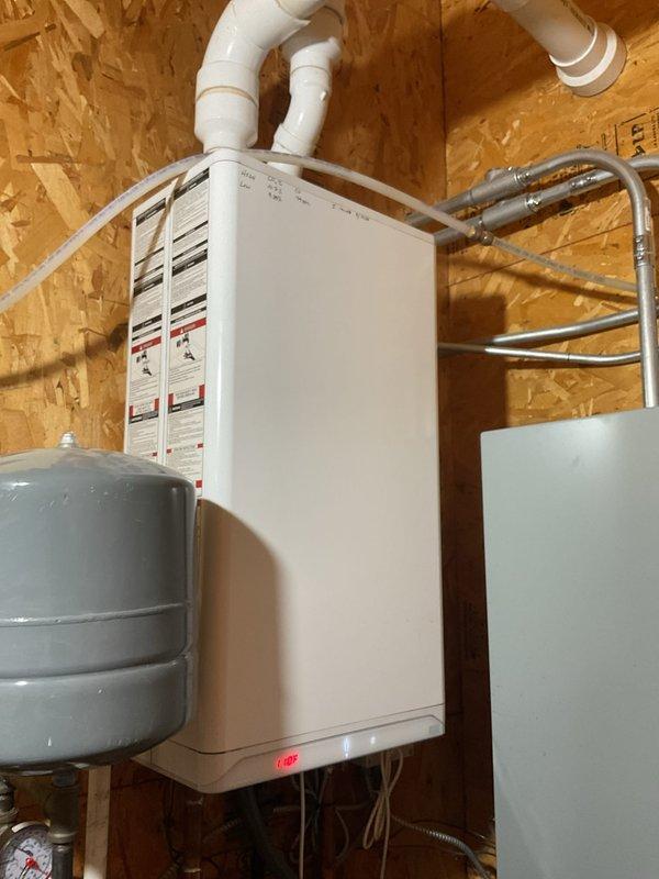 Responded to no heat call due to low water error on wall-mounted boiler. Diagnosed slow leak with no auto-fill capability from initial installation. Attempted to clean water fill valve but insufficient water pressure prevented proper operation. Manually filled system using hose to restore proper water pressure. Performed combustion check and cleaned condensate trap to ensure optimal system performance.