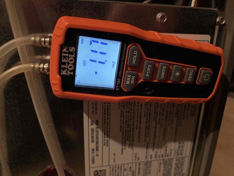 Responded to no-heat callback service call. Inspected Lennox furnace that customer reported was taking excessive time to initiate heating cycle after recent installation. Diagnostic testing with manometer showed gas pressure reading of 11.1 inH2O, which was verified to be within manufacturer specifications. System is now operating normally with proper ignition sequence and heat output.